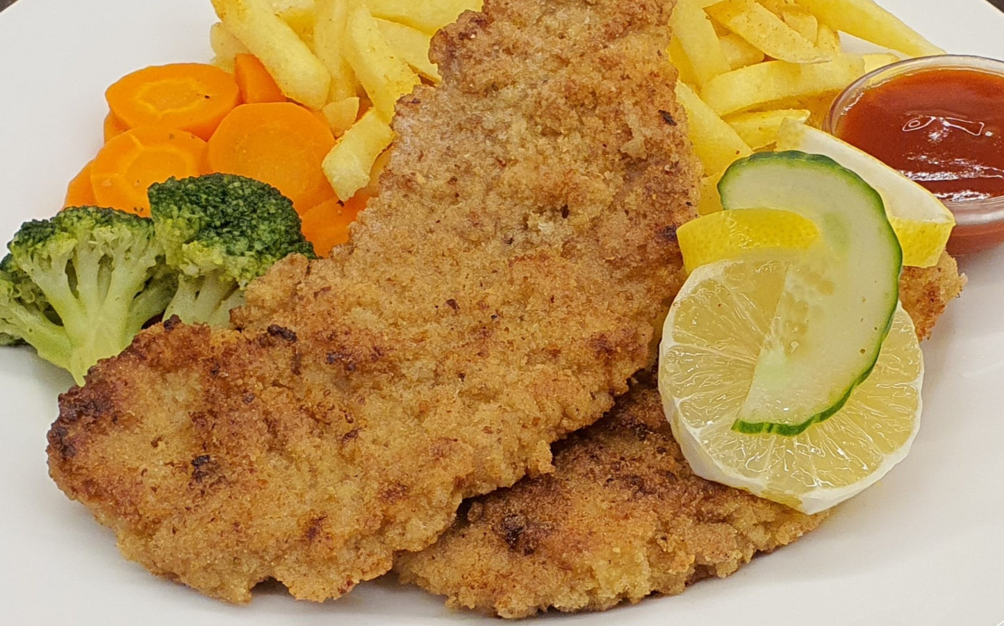 Schweinsschnitzel paniert